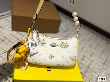 COACH TERI FLORAL CONTRAST SHADES WITH CHARM ACCESSORY