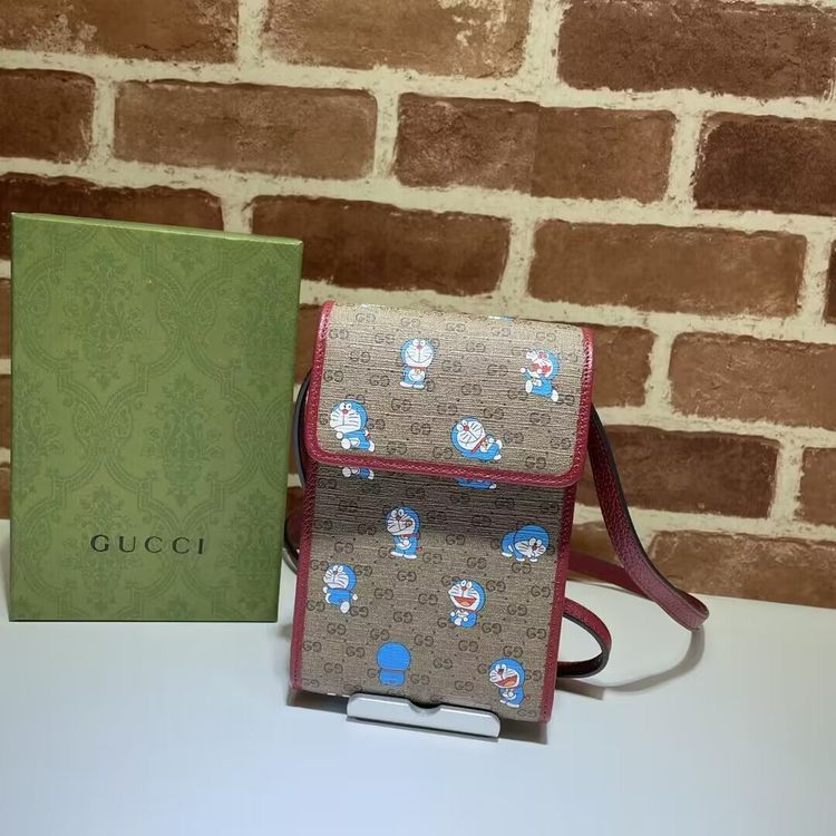 GUCCI DOREMON MOBILE SLINGS