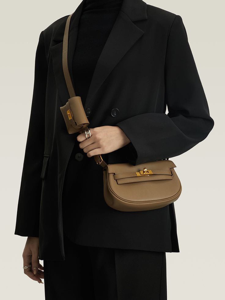 HERMES SWIFT KELLY MOOVE SLING BAGS