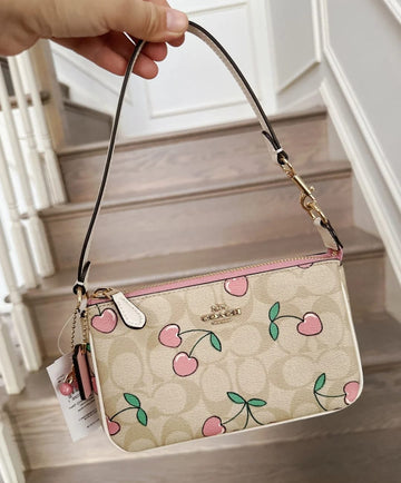 COACH FLORAL SLING BAGS