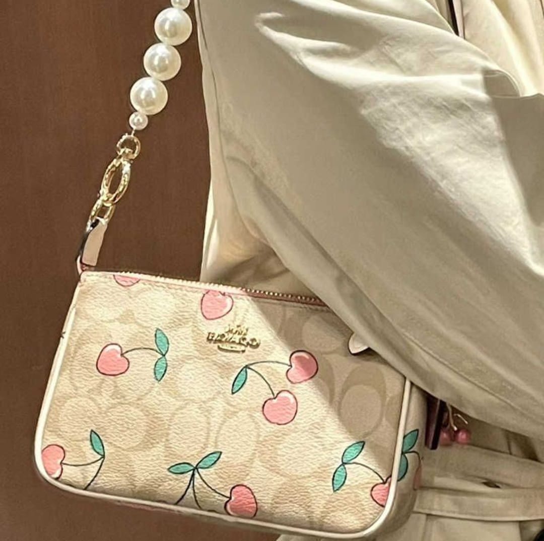 COACH SLING BAGS