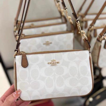 COACH SLING BAGS