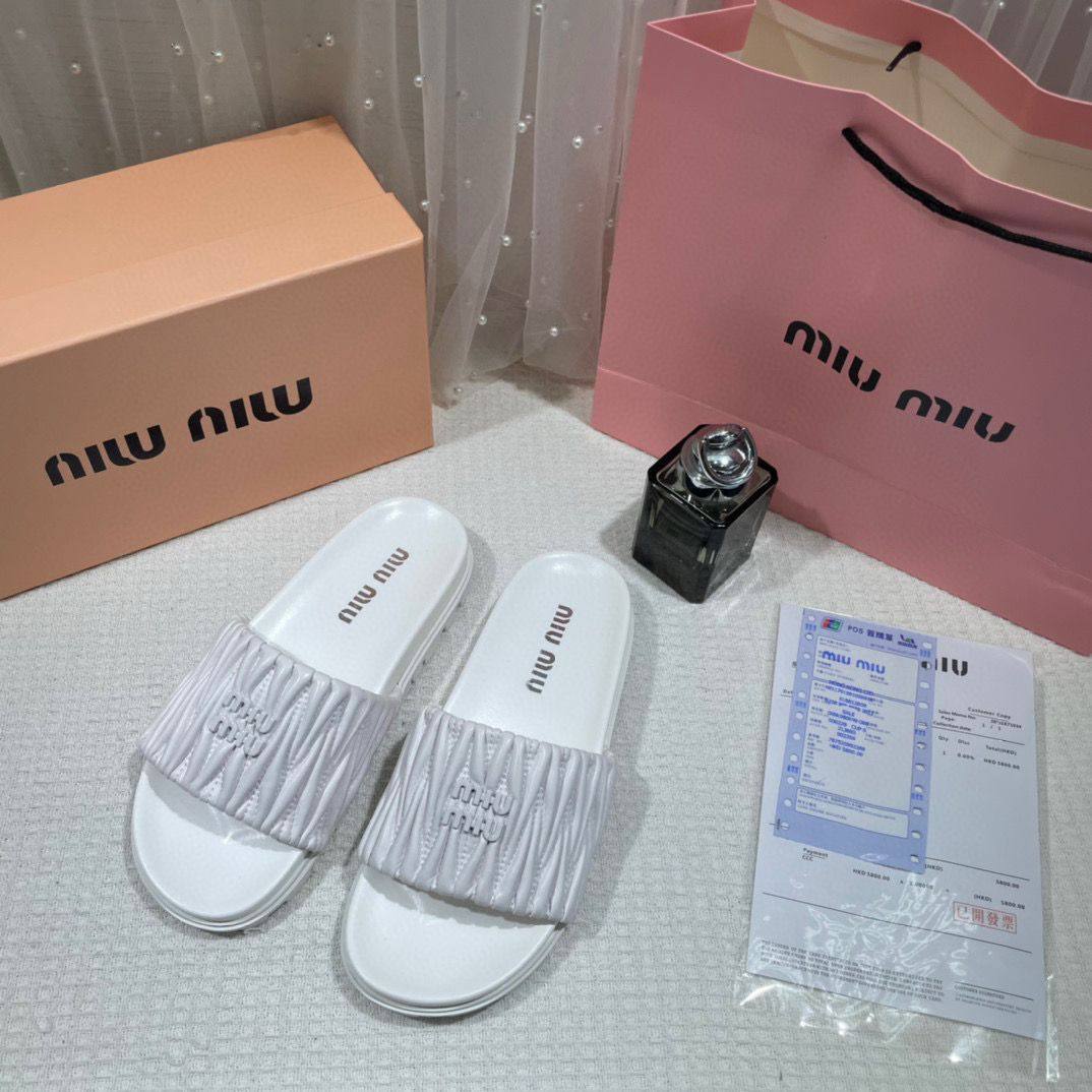 Miu Miu Matelasse Slides For Woman