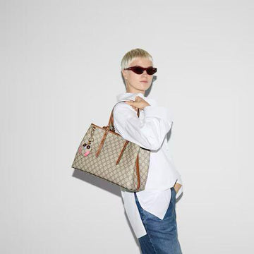 GUCCI EMBLEM TOTE WITH CHARM
