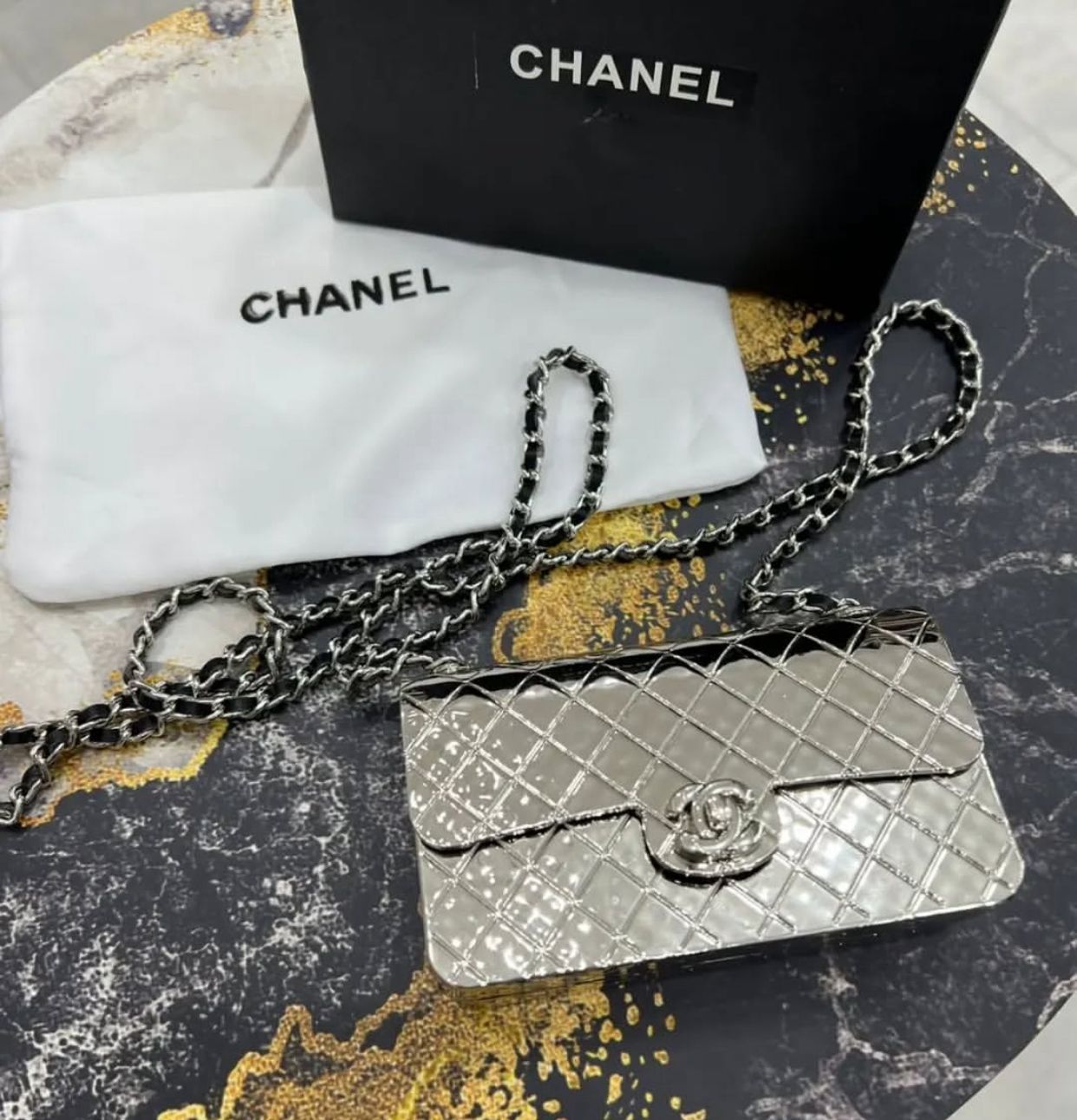 CHANEL METAL MINI SLING BAG