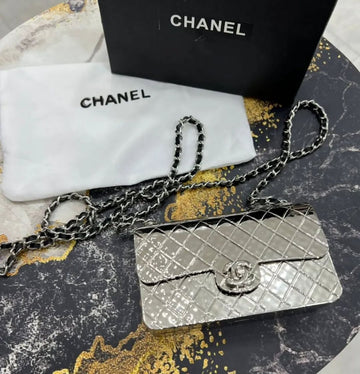 CHANEL METAL MINI SLING BAG