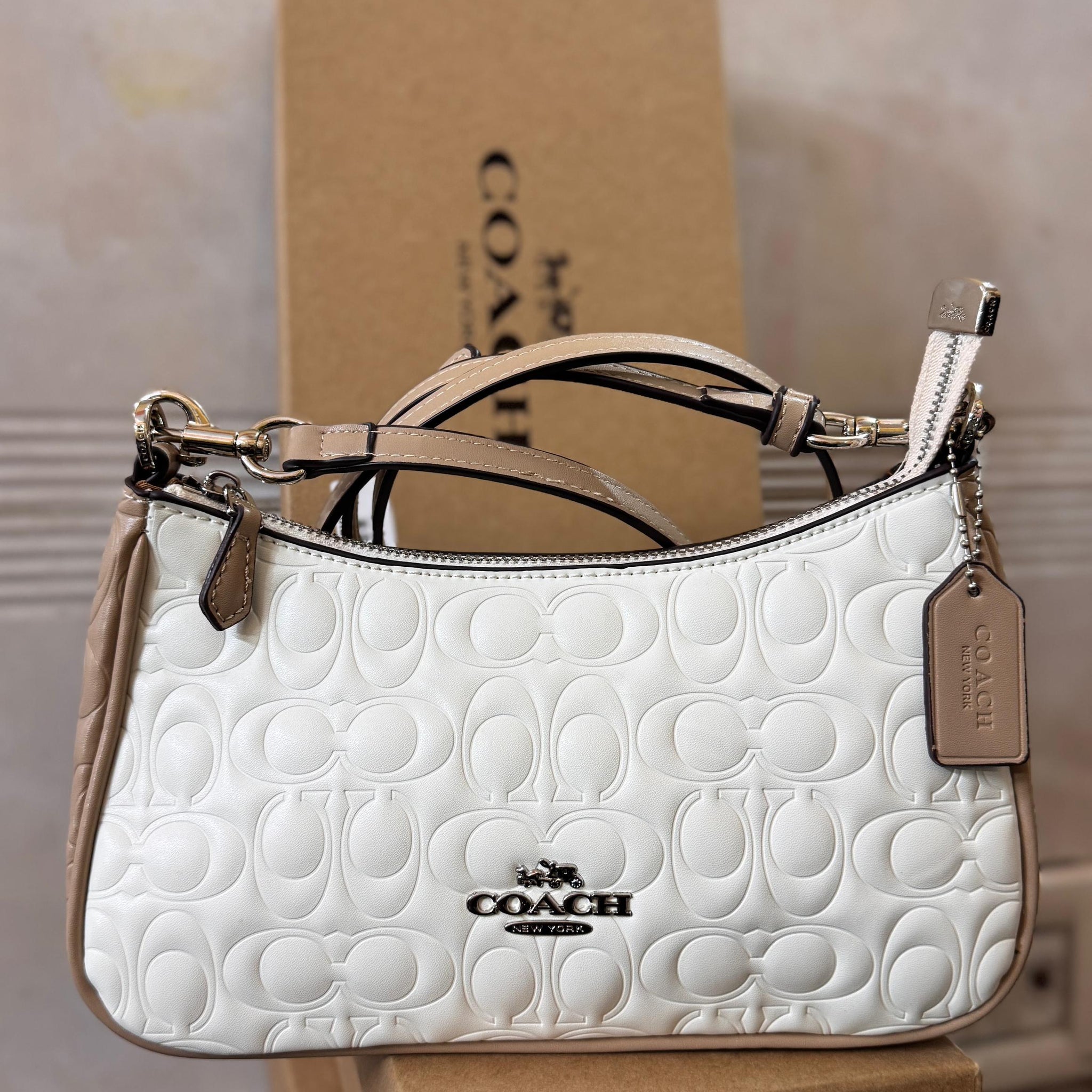 COACH TERRY EMBOSSED