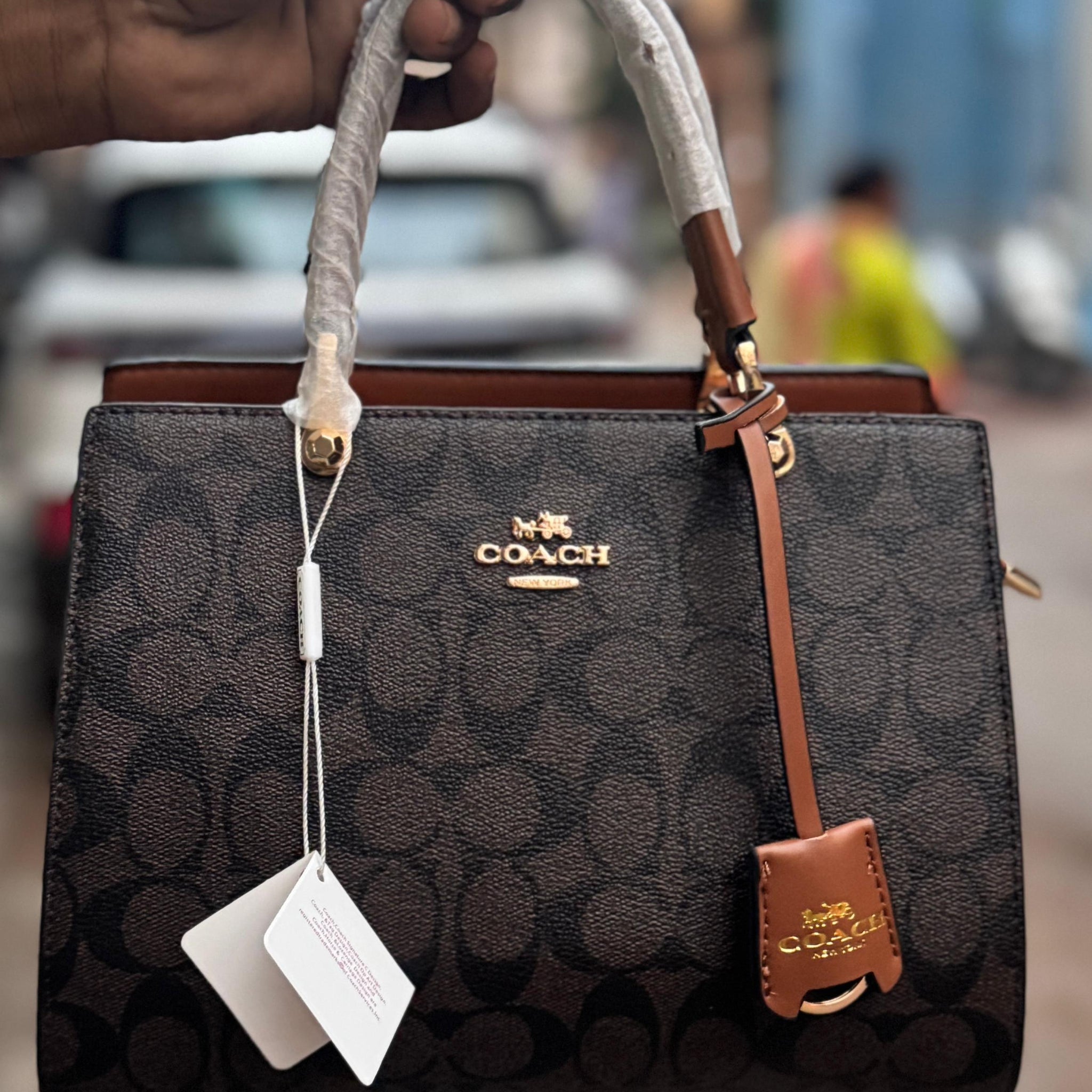 COACH HANDBAGS WITH PARTITION INSIDE AND LONG BELT