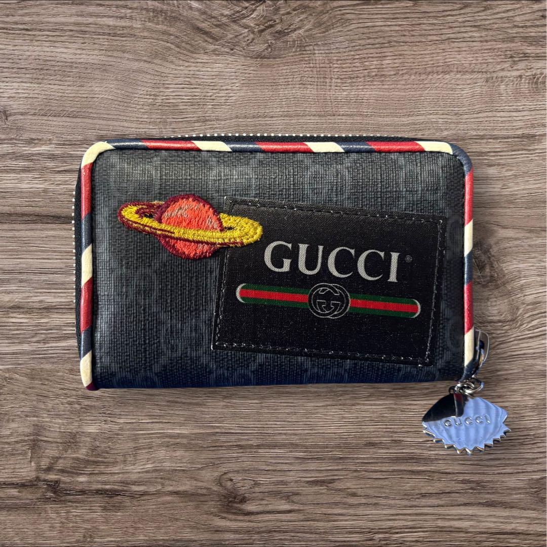 GUCCI GG SUPREME NIGHT COURIER WALLET